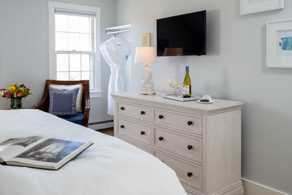 The Seabreeze Room is located in the Carriage House on the second level with a King-sized bed. You can enjoy the luxury and elegance of the inn while also enjoying a semi-private deck that truly gives you the Cape Cod beach cottage feel.