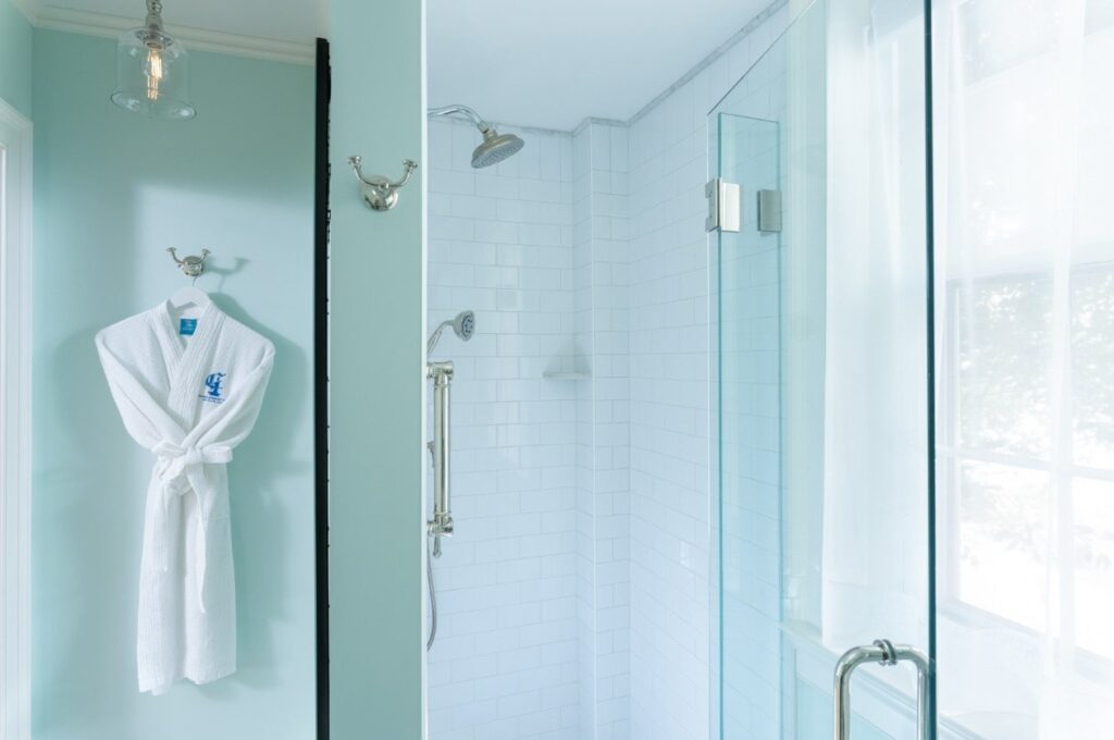 And now the Breezing Up Room’s newly renovated private bathroom includes a tiled shower with premium shower head and handheld fittings, as well as marble mosaic tile and stone finishes throughout the bathroom, for your ultimate relaxation and pampered Cape Cod getaway.