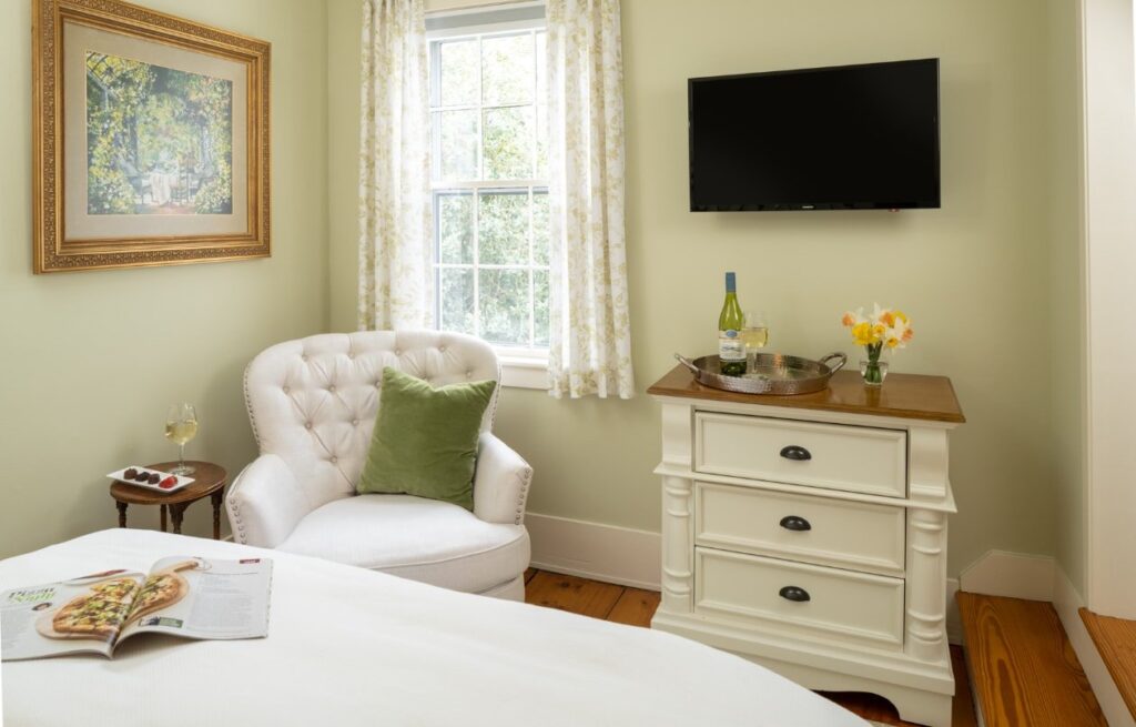 Queen-sized bed and private bath tucked away on the second level in the Main House with views of the west gardens.