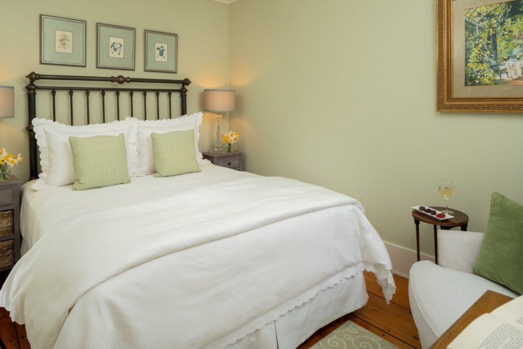 Queen-sized bed and private bath tucked away on the second level in the Main House with views of the west gardens.