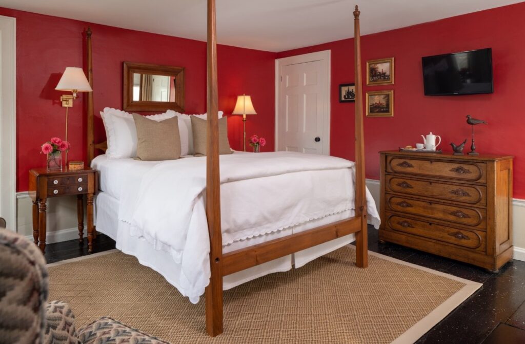 The Highlands Room offers a Queen-sized, four-poster Shaker bed and a wood burning fireplace.