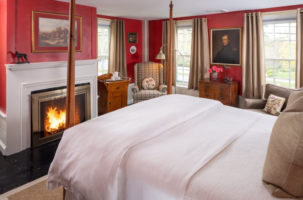 The Highlands Room offers a Queen-sized, four-poster Shaker bed and a wood burning fireplace.