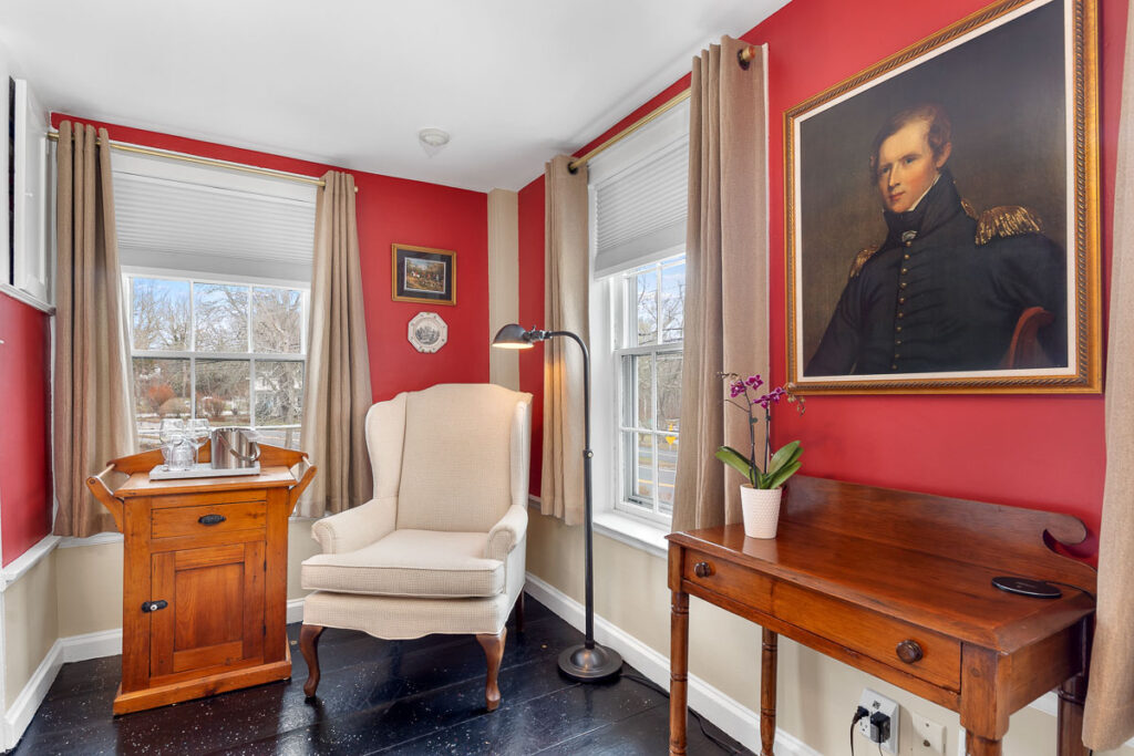 The Highlands Room offers a Queen-sized, four-poster Shaker bed, wood burning fireplace, and views of the west and front gardens.