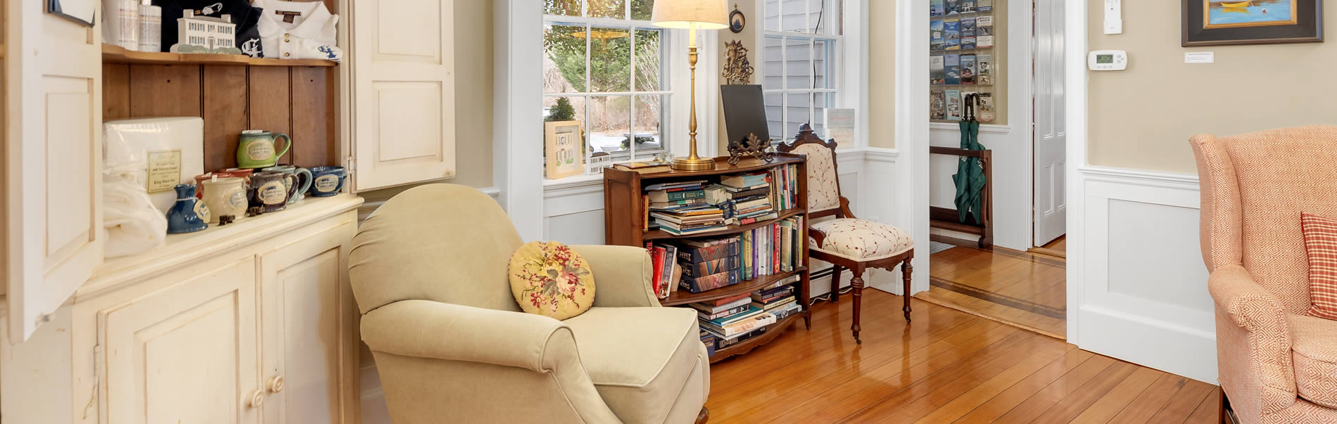 living room with gift shop and reading area - Our Cape Cod bed and breakfast specializes in comfort and simple elegance