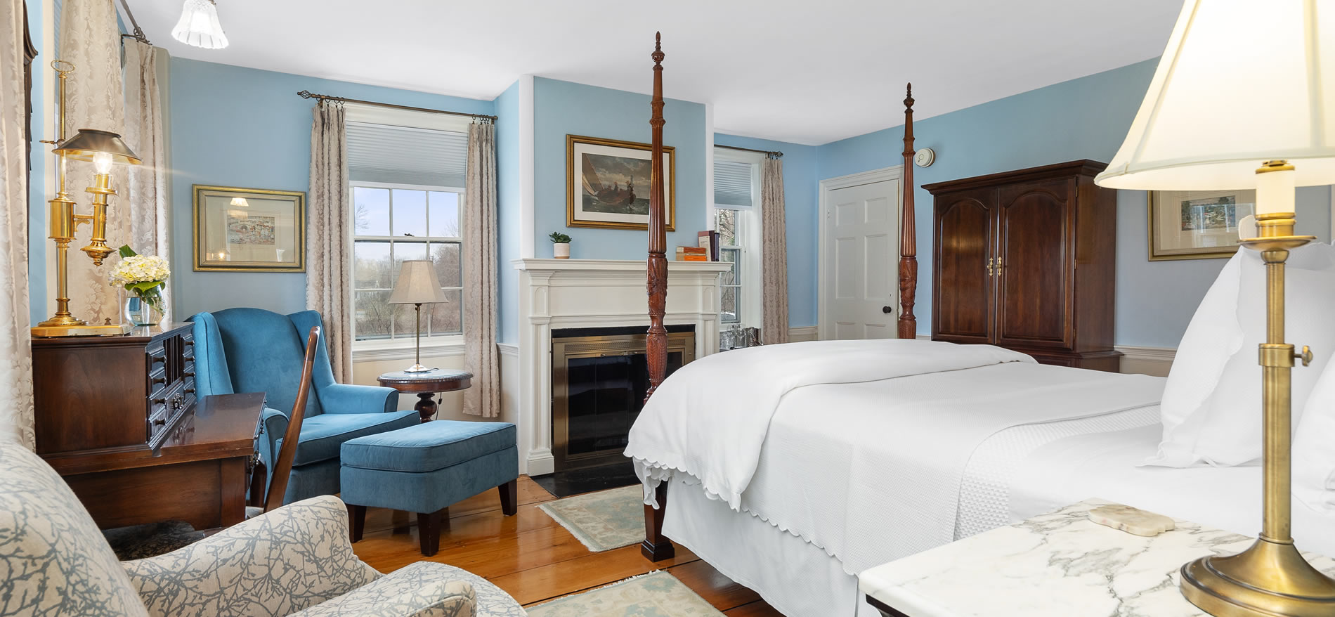 cape cod elegant guestroom at bed and breakfast - fireplace, bed and chair