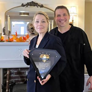 Eric and Charlene with AAA Four Diamond Award